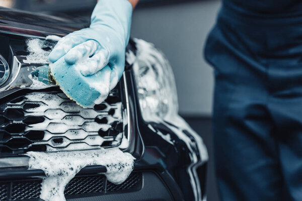 depositphotos_310988938-stock-photo-partial-view-car-cleaner-washing
